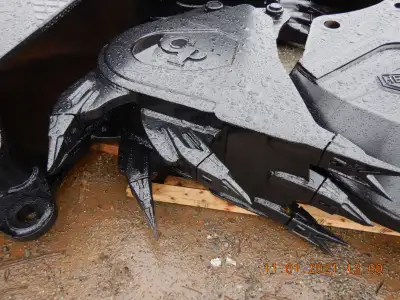 Tiger Teeth On the CP 24-Inch Extreme Ripper Bucket with Offset Long Ripper Shanks Extreme duty buck...