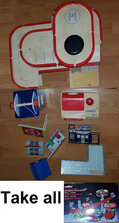 Take entire lot as seen in photos. Includes PlanCity Wooden toys (some misc pieces as well) and Mont...