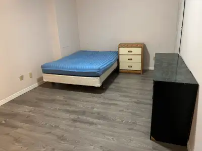 A basement room with separate washroom
