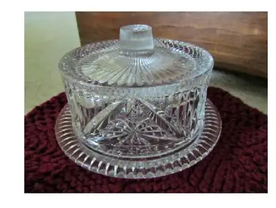 Pinwheel Crystal Covered Butter dish set to make a nice centerpiece to your serving set. Measures 6”...