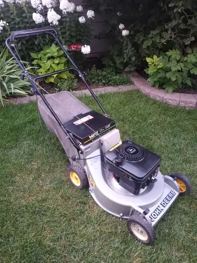 John Deere 14PZ 21 inch mower in very good condition, View more