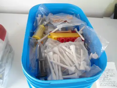 TWO BUCKETS OF GOLF TEES, View more