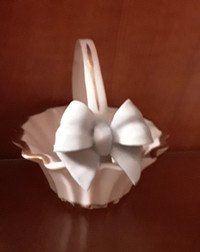 Porcelain flower basket with a blue bow