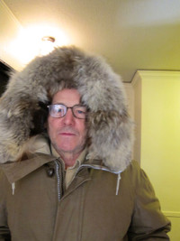 Goose down coat with real wolf fur hood