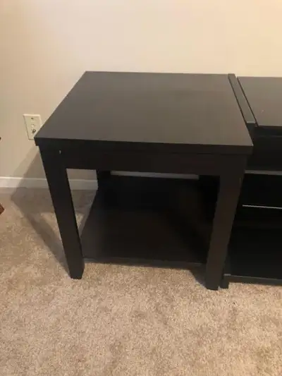 Two Black wood end tables, View more