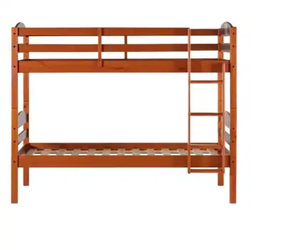 Selling a sturdy solid pine wood bunk bed in a beautiful amber stain finish. Perfect for kids’ rooms...