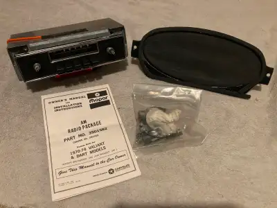 This is not just a radio. This is a factory fresh slice of Mopar history. Here’s what makes this pie...