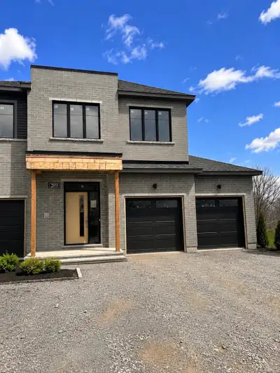 Be the first to live in this brand-new executive end-unit townhome located at 289 Bankside Way, no r...