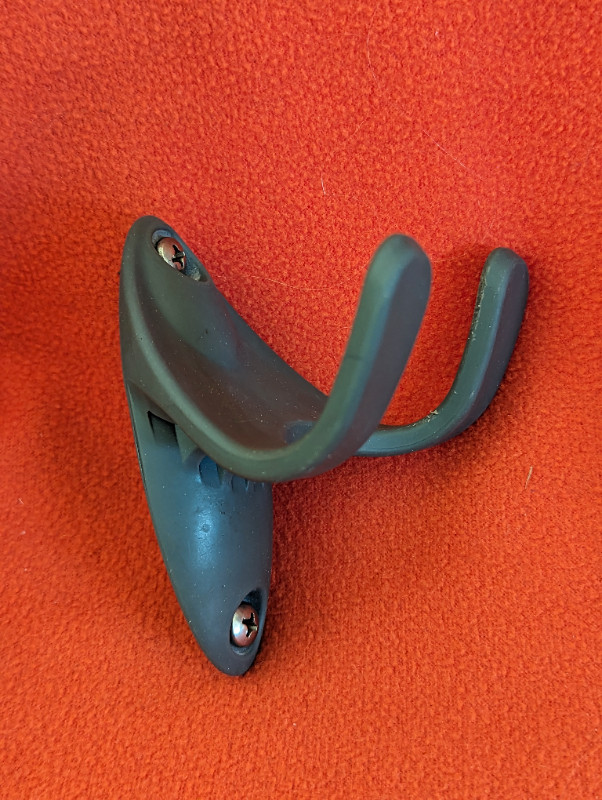 Two-armed wall hook and a package of mounting clips in Other in Edmonton - Image 2