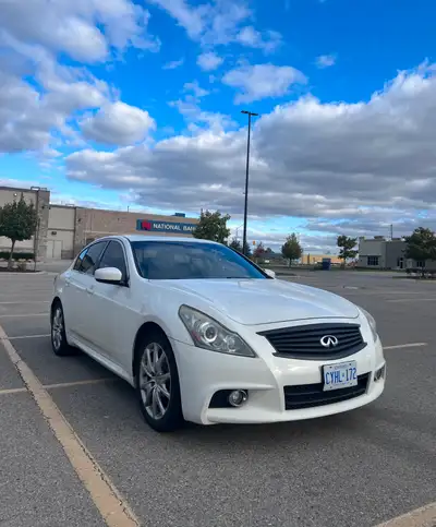 Selling my 2012 Infiniti G37XS in pearl white with an all black interior. Comes fully loaded, backup...