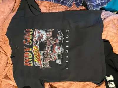 Own a piece of racing history with this vintage Indy 500 Champion t-shirt, perfect for any motorspor...