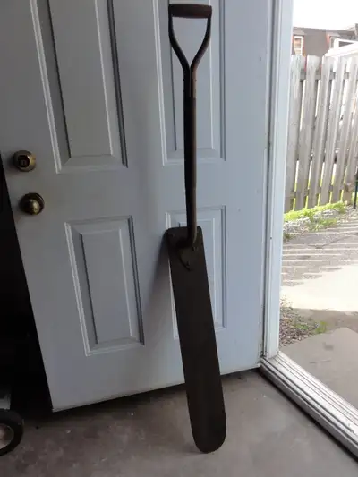 Collectible rare D handle shovel with long narrow spade was used on the railroad to level off the gr...