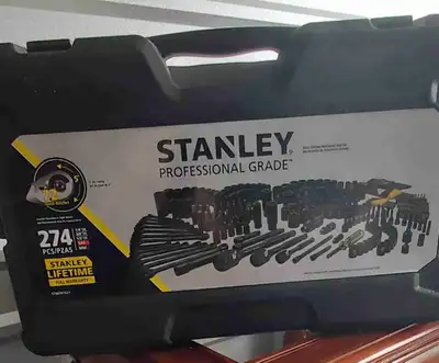 This is a Stanley Professional Grade 274-piece Black Chrome Mechanics Tool Set, which includes SAE a...
