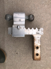 Aluminum adjustable trailer hitch with 1 7/8 and 2 inch ball.
