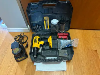 Complete Drill kit with extras. 18V battery and charger included. Drill Bits, Driver Tips, Nut Drive...
