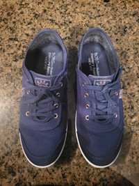 Woman's Bob's blue canvas shoes. 