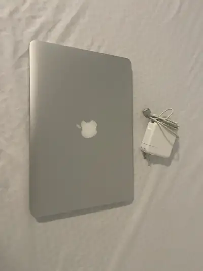 Selling a used Apple MacBook Pro in good condition, a reliable machine for all your computing needs....