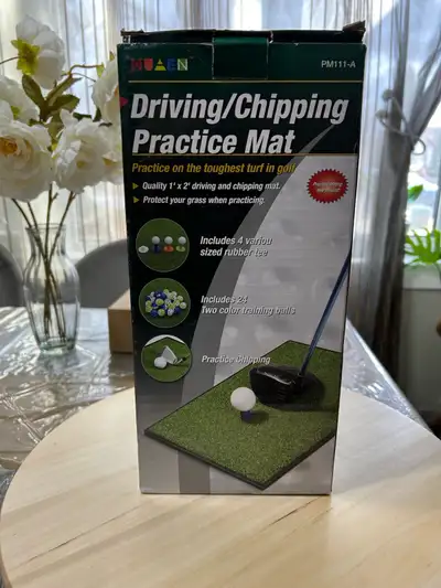 Practice your swing indoors or out with this new golf hitting mat, measuring 2ft x 1ft, designed wit...