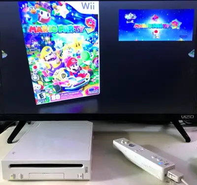 Nintendo Wii with lots of games, View more