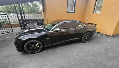 Needs timing chain and TPMS light on Runs and drives Has the SS front bumper, custom steering wheel...