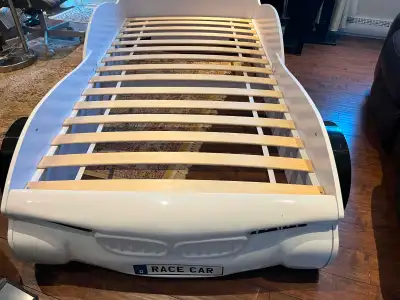 Kids car bed in excellent condition Twin size bed Delivery available in the West Island for extra ch...