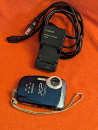 Fujifilm Finepix XP camera with strap and battery charger