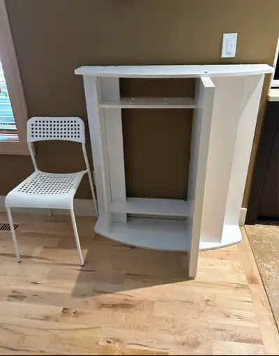 White floating wall desk with white IKEA Adde chair. Securement bar, screws, and wood compartment di...