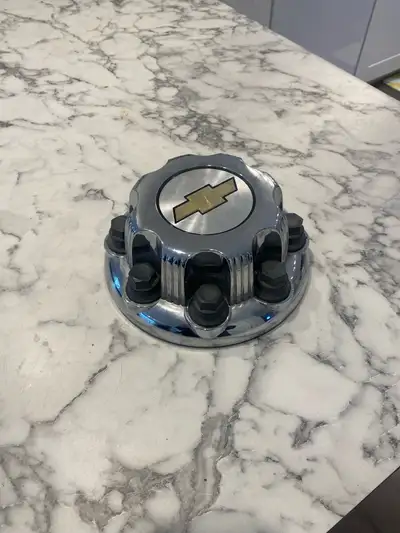 Like new 2500 Chevrolet wheel hub cap. $10. This is OEM, not aftermarket