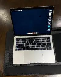 MacBook Pro 13" Retina display with Touch Bar and Touch ID