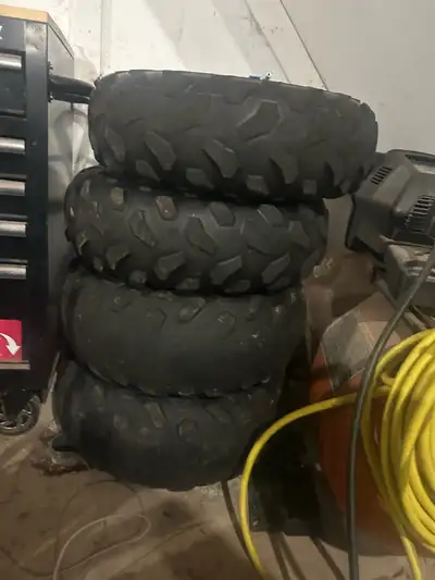 Selling my can am rims and tires Bolt pattern 4x137 Front tire are 25x8-12 Back tires are 25x10-12 T...