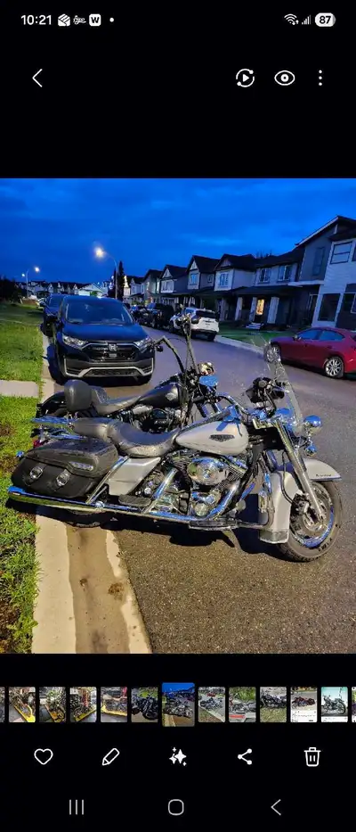 I'm selling my used Harley Davidson Road King, a true icon of the road. This bike has a smooth ride....