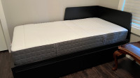 Brand new guest bed with mattress.