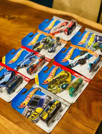 9 Hot Wheels Cars - New in packages, View more