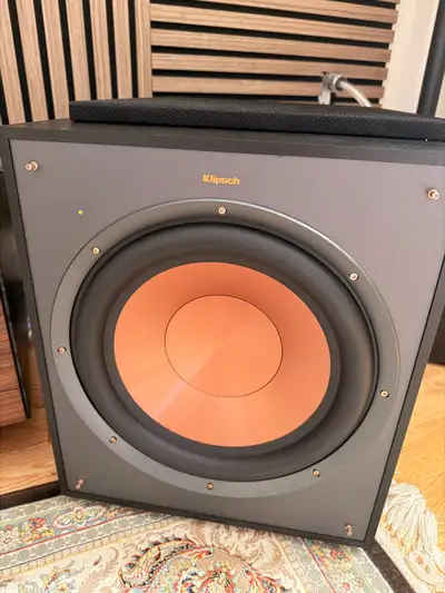 Experience deep, powerful bass with this Klipsch subwoofer, featuring a signature 12-inch spun-coppe...