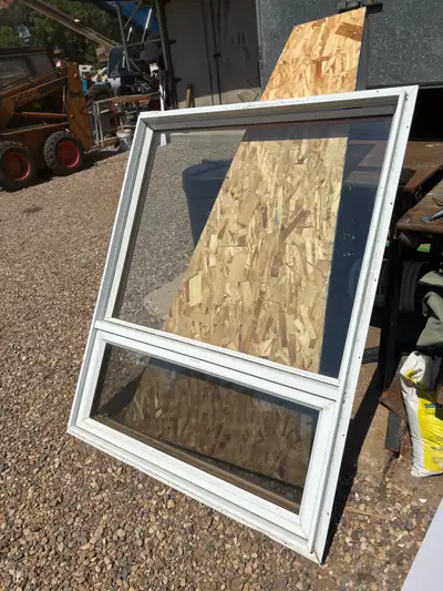 Dual pane used window. 4 1/2 inch jamb Aluminum exterior with nailing flange and wood interior