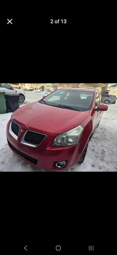 Selling my mom's red 2009 Pontiac Vibe AWD 2.4L with 183,000 km. On winter tires. Always serviced re...