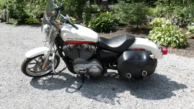2011 harley sportster superlow with screaming eagle 1200cc upgrade. Vance-hines exhaust. New tires a...