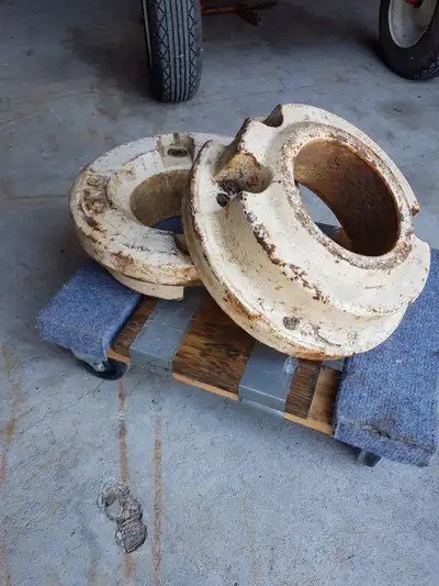 I have a set of heavy cast iron wheel weights for a older lawn tractor with the 5 bolt hubs. These a...