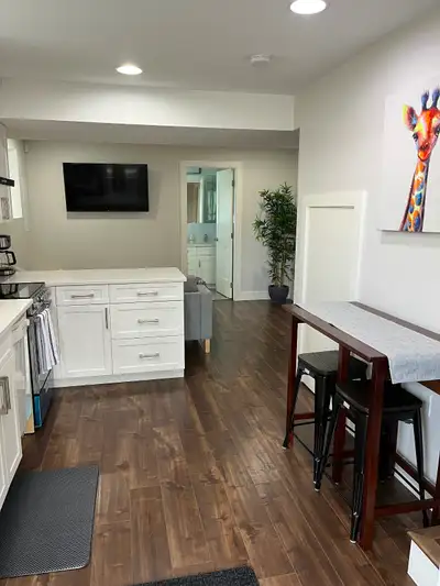 A beautiful new 2 bedroom nestled in a quiet neighborhood. Fully furnished featuring an open space w...