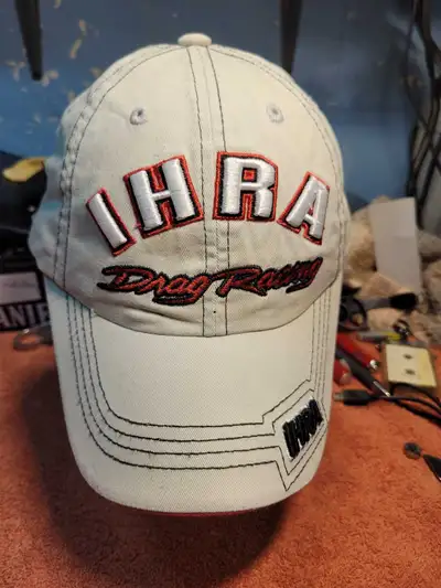 Cool IHRA Drag Racing hat. Light colored hat with IHRA Drag Racing embroidered on the front. Also ha...