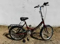 Vélo pliant Schwinn , roue 20 pouce , bourgogne.  200 $