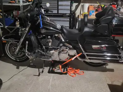 Beautiful black and chrome, low km, too much to list, extras include helmets, winter cover and stand...