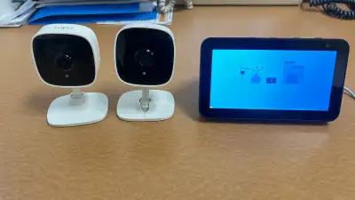 I'm selling a setup that includes an Amazon Echo Show 5 along with two TP-Link Tapo security cameras...