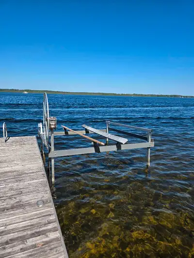 Selling a Dock Rite 3000 boat lift in used condition, perfect for securely lifting your boat out of...