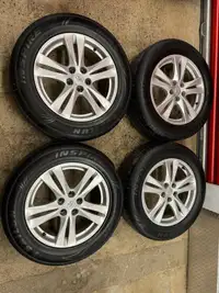 Hyundai Santa Fe/Kia original alloy rims on all season tires