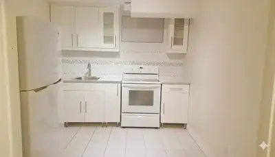 young professionals or mature university students. 2 Bedroom basement apartment with spacious den an...