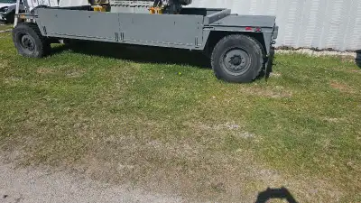New trailer. Was parked at my yard for a while. Comes with spare tire Painted in gray.