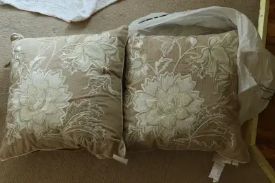 brand new, A bold, embroidered-cushion, paired with a plush, velvet cushion of the same colour. The...
