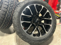 G100. New CV67MB 2024 GMC Chevy 1500 rims Toyo OpenCountry AT3