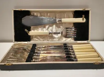 Silverplated EPNS A1, sterling collars, celluloid handles 6 each dessert-sized forks and knives plus...